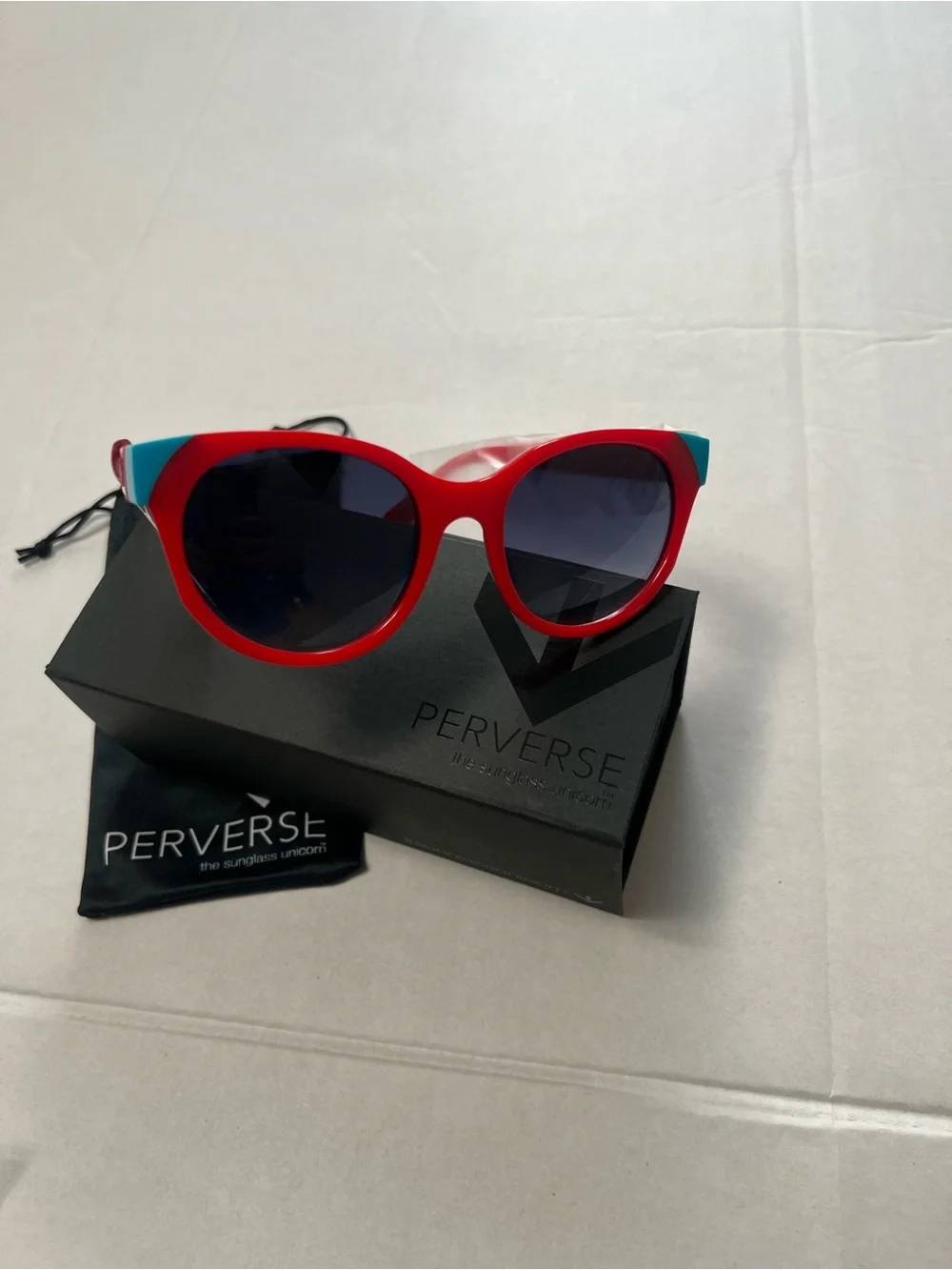 PERVERSE Red & Blue women’s  Sunglasses — Bold Two-Tone Frame